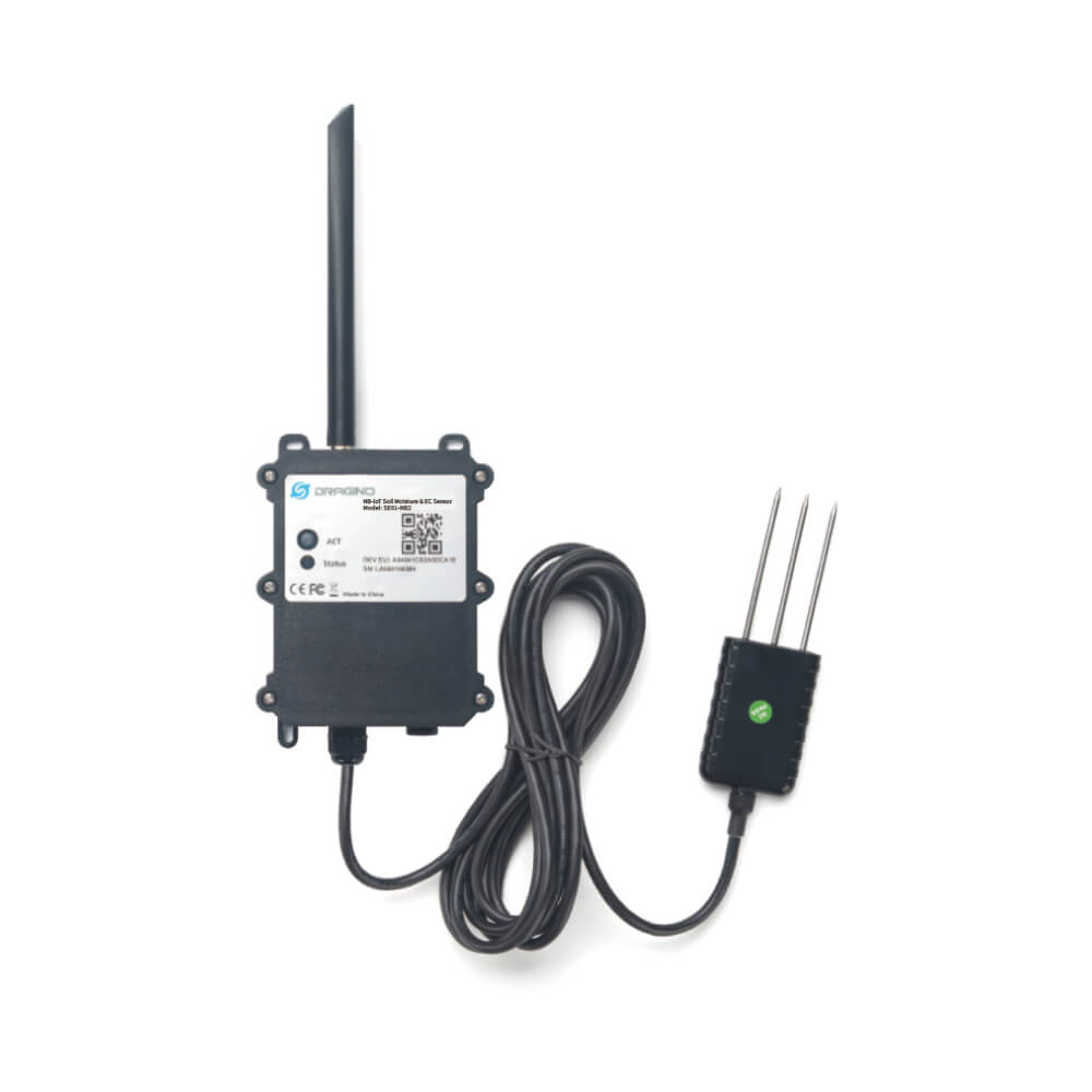Dragino SE01 NB-IoT cellular soil sensor measuring moisture, conductivity, and temperature in an industrial enclosure.