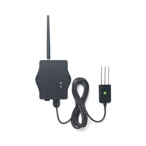 Dragino SE01 NB-IoT cellular soil sensor measuring moisture, conductivity, and temperature in an industrial enclosure.
