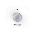 Milesight WS202 LoRaWAN PIR motion and light sensor with compact white enclosure for indoor occupancy monitoring.